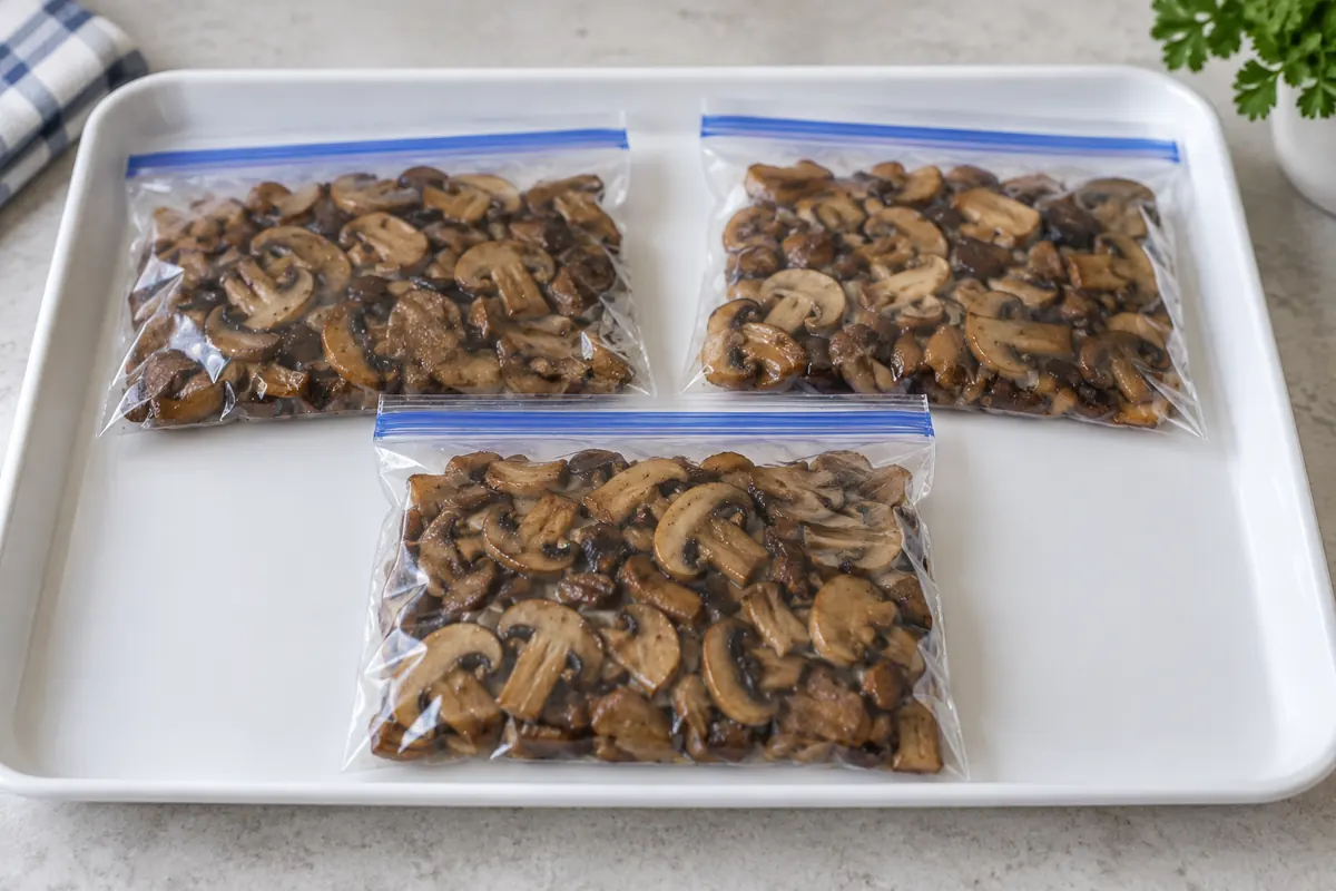 Freeze cooked mushrooms in usable portions